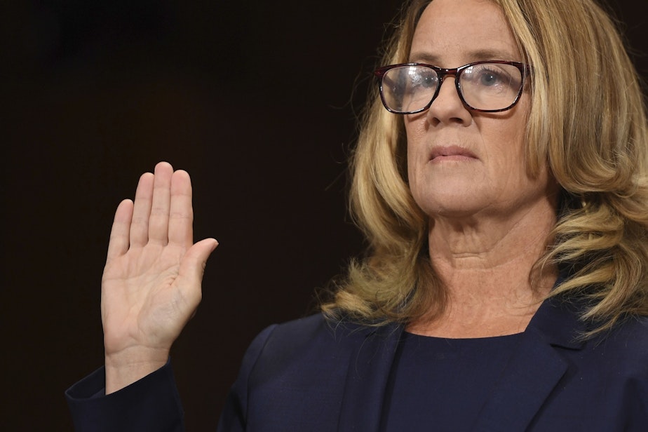 caption: Christine Blasey Ford is sworn in to testify before the Senate Judiciary Committee on Capitol Hill in Washington, Thursday, Sept. 27, 2018. 