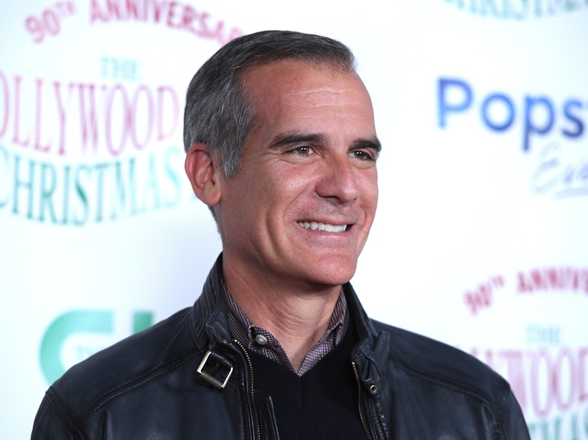 caption: Former Los Angeles Mayor Eric Garcetti attends the 90th Anniversary of the Hollywood Christmas Parade on Nov. 27, 2022 in Hollywood, California.