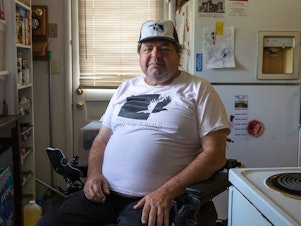 caption: The house that John High rents with his son in Norman, Okla., doesn't even have a windowless room he could retreat to in a tornado, he says, and he can't afford to build a a wheelchair-accessible storm shelter.