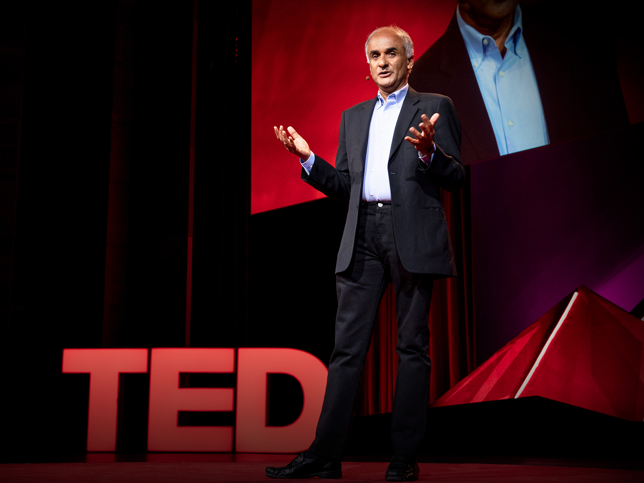 caption: Pico Iyer speaks at TEDSummit: A Community Beyond Borders. July 21-25, 2019, Edinburgh, Scotland. Photo: Bret Hartman / TED