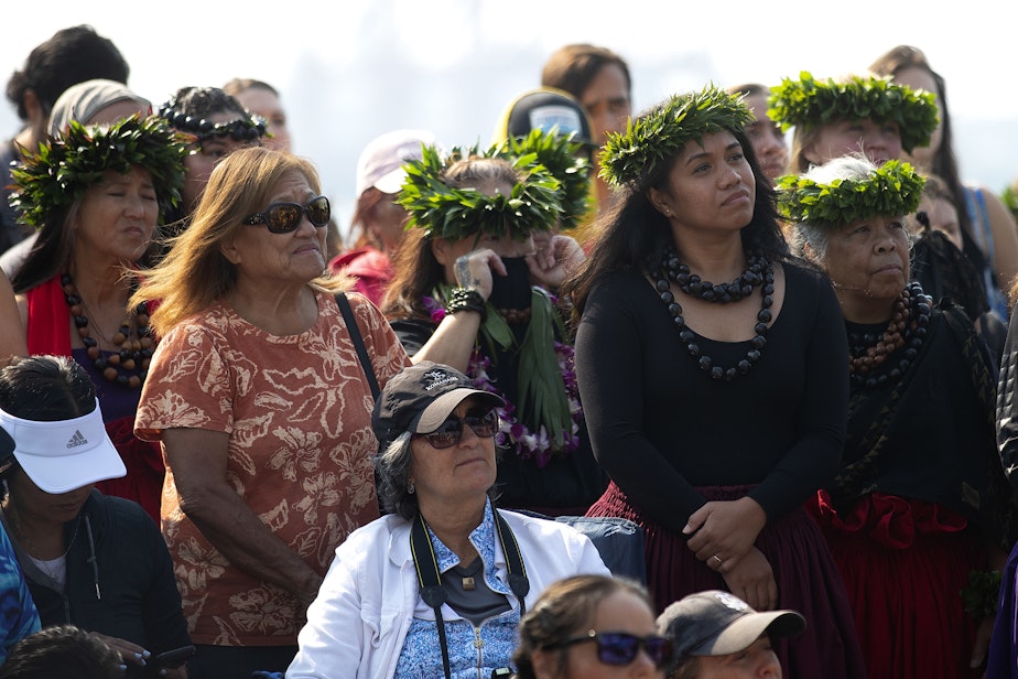 caption: A welcome ceremony for Hokule’a, the 49-year-old replica of an ancient Polynesian voyaging canoe, takes place at  Pier 62, after a water welcome ceremony with Suquamish, Muckleshoot and Hawaiian canoes, on Saturday, August 26, 2023, in Seattle.