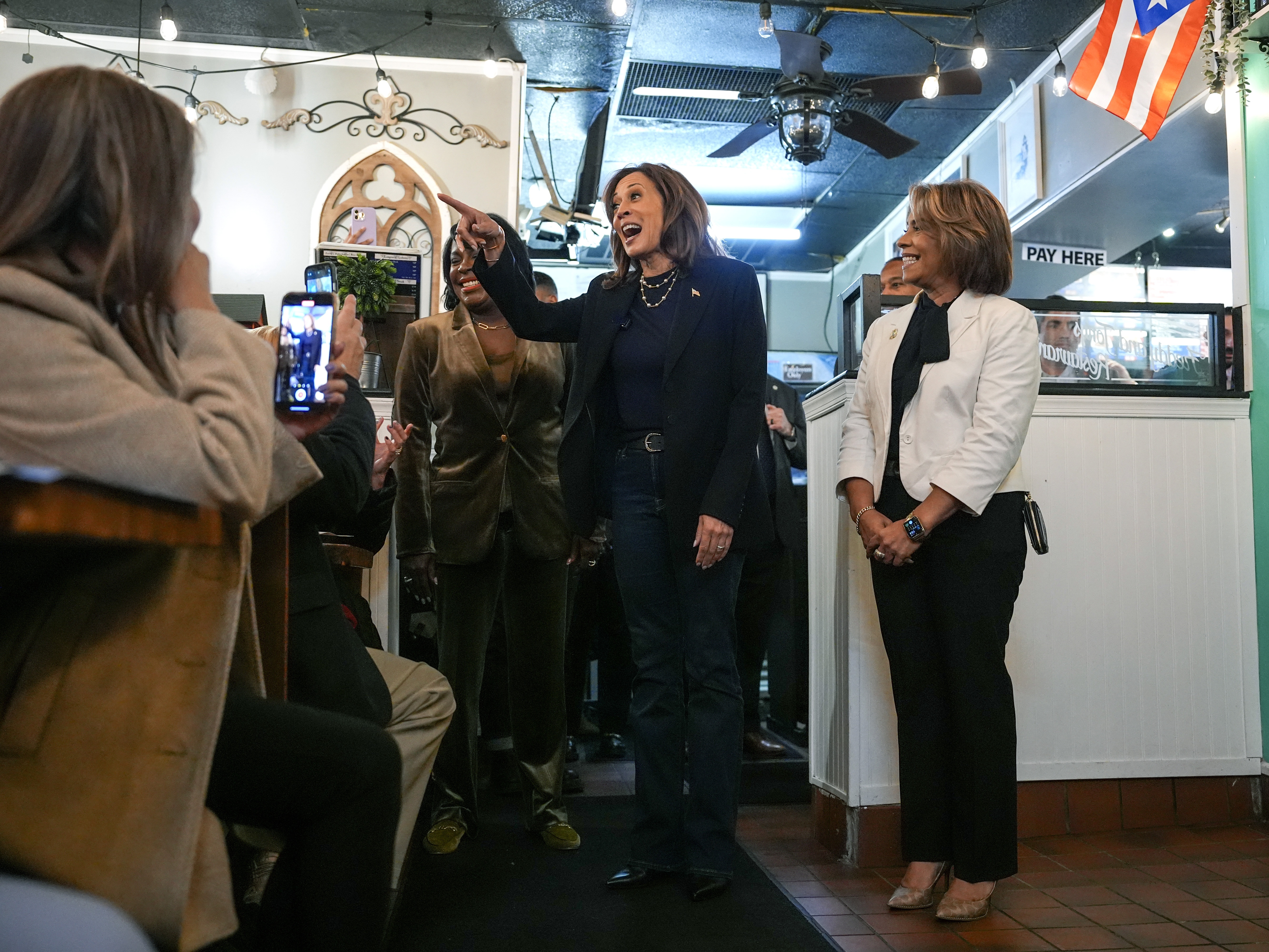 caption: Vice President Harris campaigns at Freddy and Tony’s Restaurant in Philadelphia on Oct. 27, 2024.