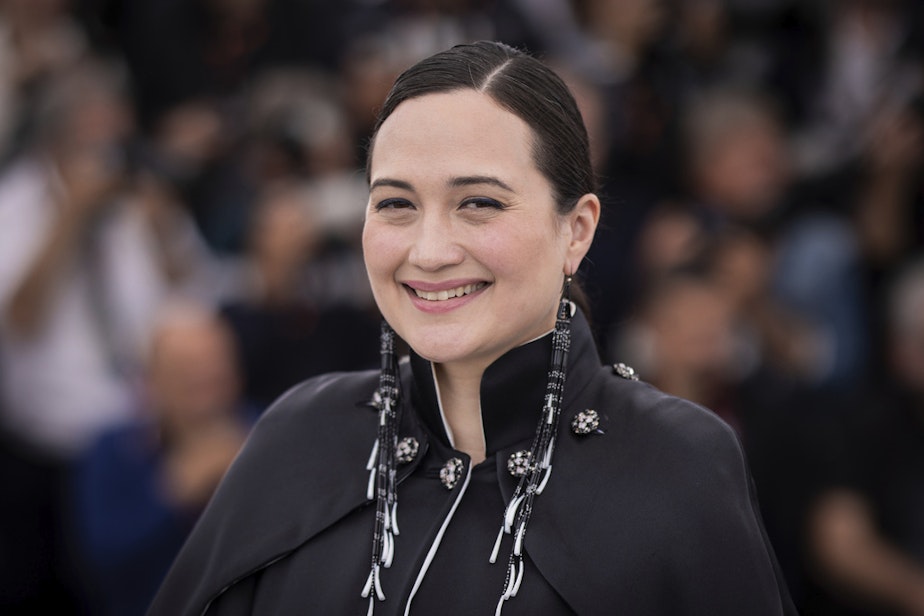 caption: Lily Gladstone poses for photographers at the photo call for the film 'Killers of the Flower Moon' at the 76th international film festival, Cannes, southern France, Sunday, May 21, 2023.
