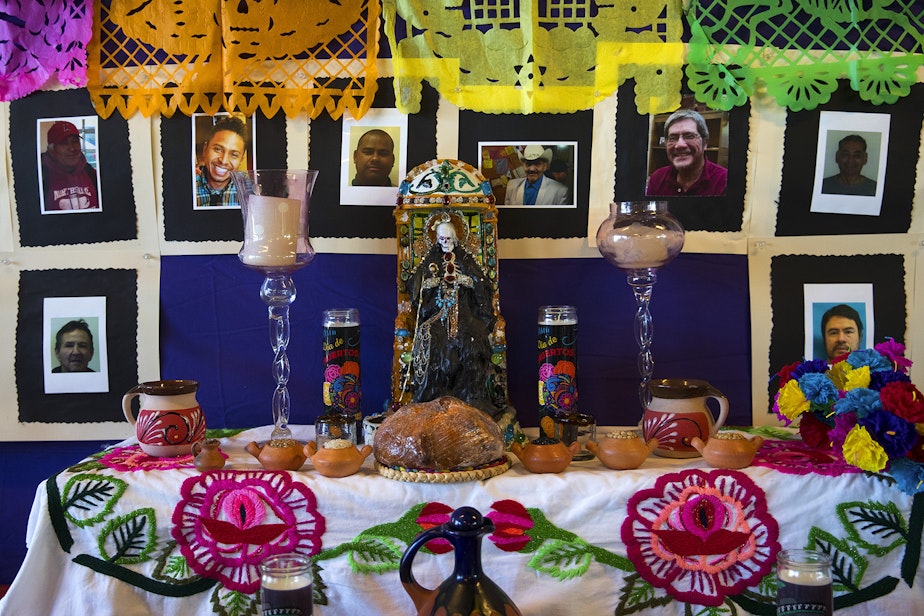 caption: The Day of the Dead altar is shown on Tuesday, October 29, 2019, at Casa Latina in Seattle.