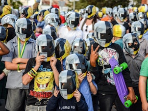 caption: Fans photographed on the eve of Daft Punk's album launch, held in the tiny Australian town of Wee Waa, on May 17, 2013.