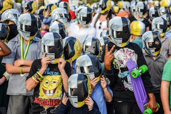 caption: Fans photographed on the eve of Daft Punk's album launch, held in the tiny Australian town of Wee Waa, on May 17, 2013.