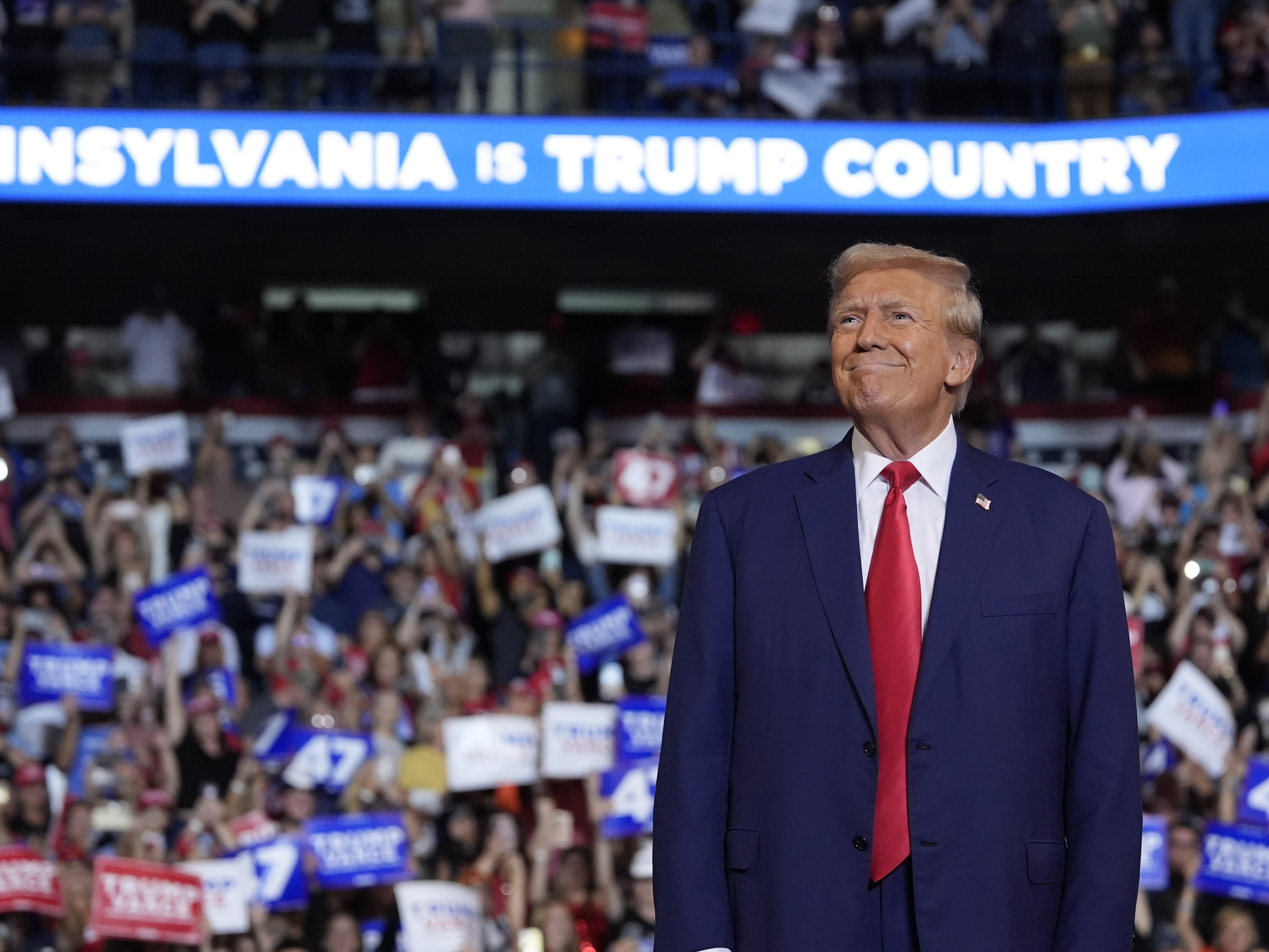 caption: Republican presidential nominee former President Donald Trump arrives to speak at a campaign rally Saturday, Aug. 17 in Wilkes-Barre, Pa. Trump and his campaign have planned a week of events, including stops in Pennsylvania, to counter the Democratic National Convention this week in Chicago. 