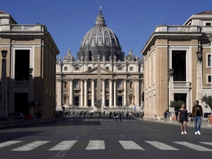 caption: A view of St. Peter's Basilica at the Vatican, March 11, 2020.