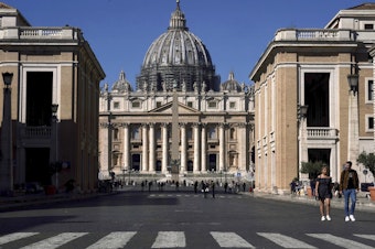 caption: A view of St. Peter's Basilica at the Vatican, March 11, 2020.