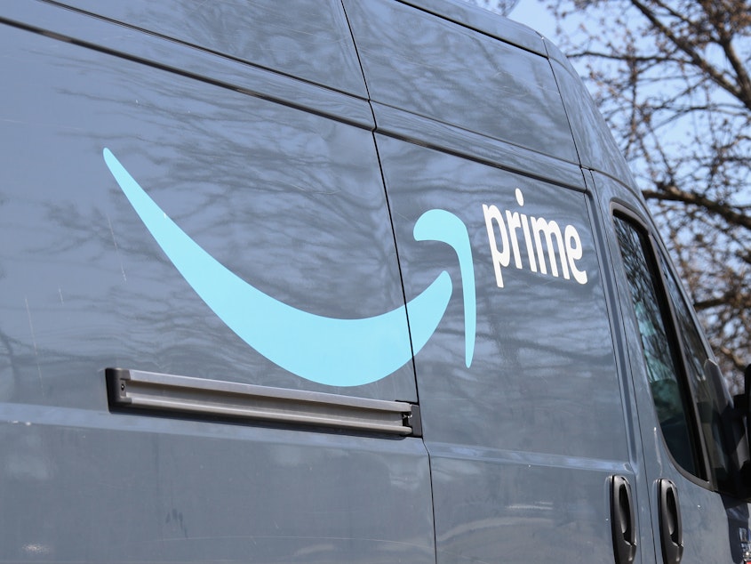 caption: An Amazon delivery truck seen on Wednesday in Plainview, New York. The online retailer says an employee at a warehouse in New York City has tested positive for coronavirus.