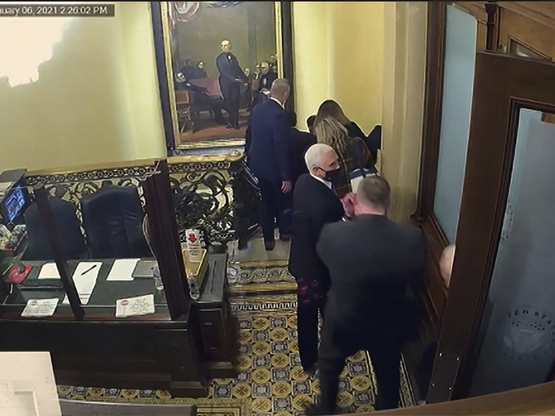 caption: A security video shows then-Vice President Mike Pence being evacuated as rioters breach the Capitol on Jan. 6.