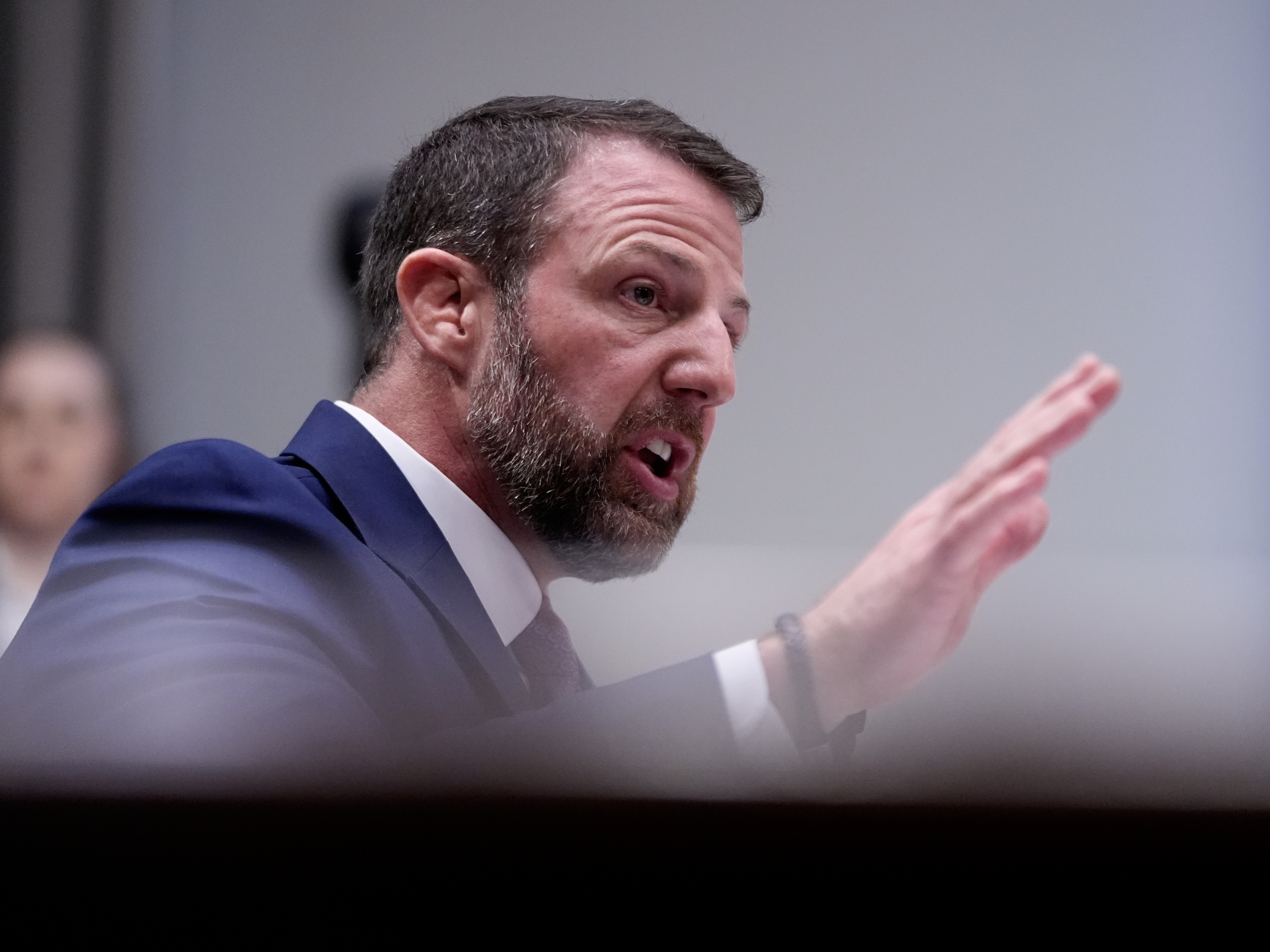 caption: Sen. Markwayne Mullin, R-Okla., seen here at his confirmation hearing on March 18, was confirmed to run the Department of Homeland Security.