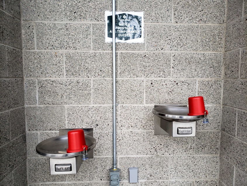 caption: Padlocked drinking fountains are one of the ways T-Mobile Park is trying to slow the spread of the coronaviurs. Thursday, April 1, 2020