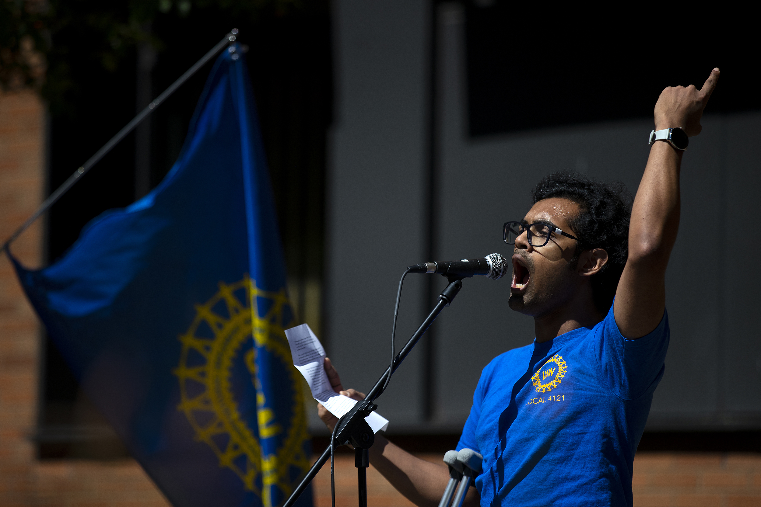 caption: Sourojit Ghosh, PhD candidate at the University of Washington, speaks to a crowd gathered ahead of the UW Board of Regents meeting on Thursday, May 9, 2024,  in Seattle. Academic Student Employees went on strike on Tuesday, May 14, 2024. 