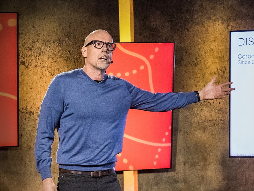 caption: Scott Galloway on the TED stage