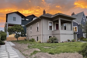 caption: A single-family home in Seattle's Greenwood neighborhood with infill housing in the backyard. 