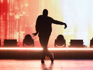 caption: Usher performs at the grand opening his Las Vegas residency, "My Way," on July 15, 2022, at the Dolby Live amphitheater at the Park MGM Hotel and Casino.