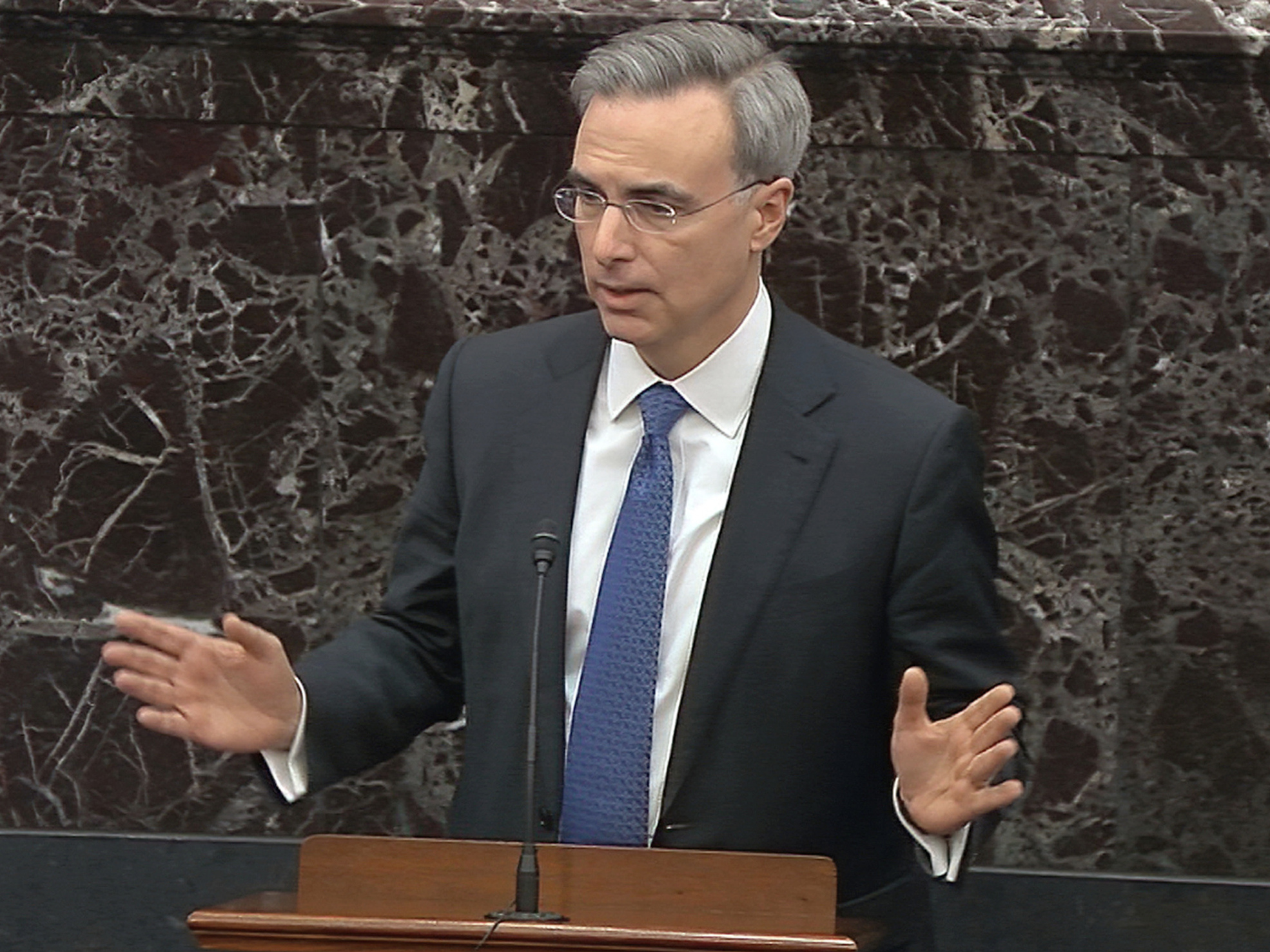caption: In this image from video, White House counsel Pat Cipollone answers a question during the impeachment trial against President Trump in the Senate.