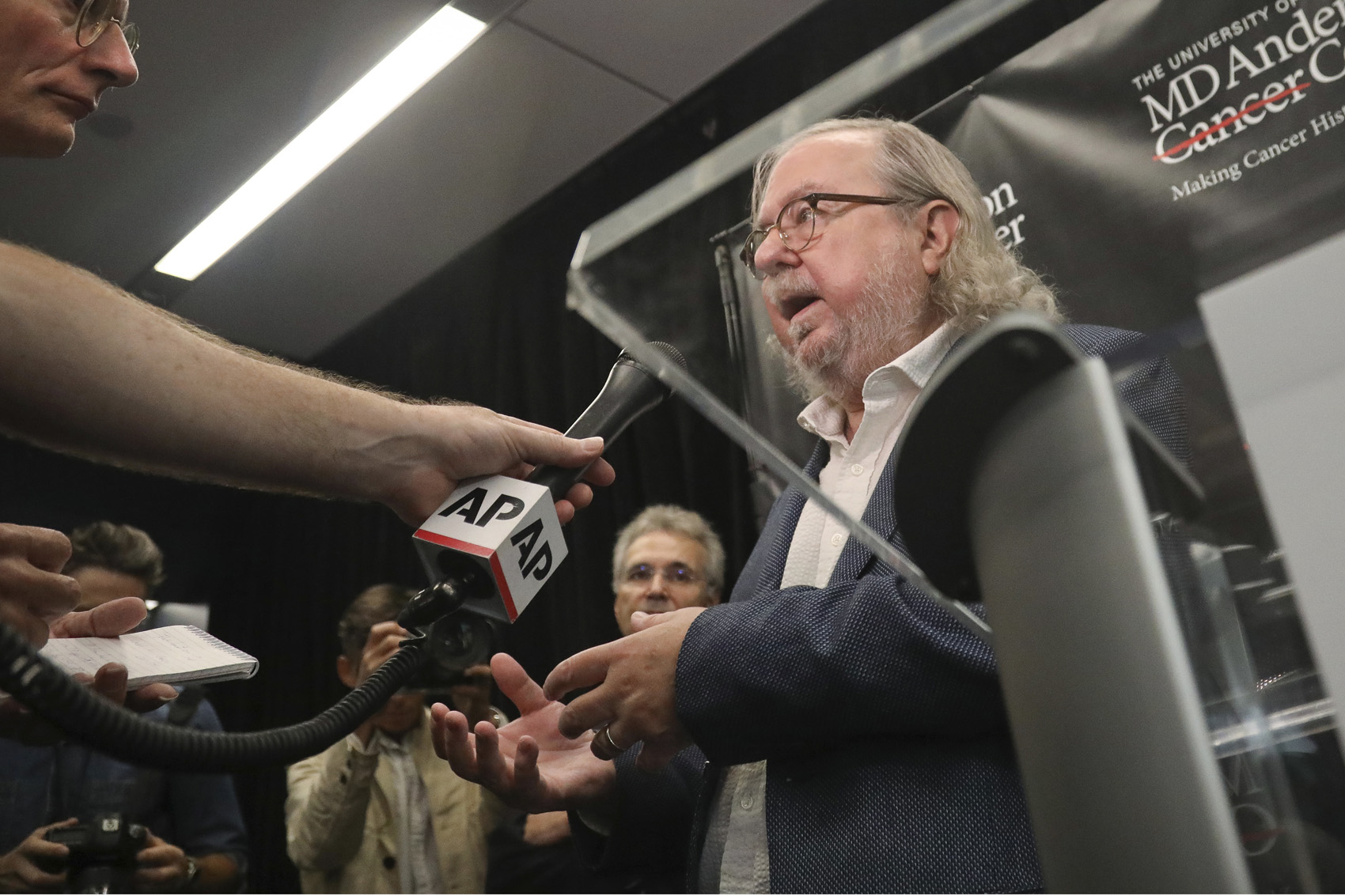 caption: James Allison, one of the 2018 Nobel Prize winners for medicine, speaks to members of the media Monday, Oct. 1, 2018, in New York. Allison and Tasuku Honjo won the Nobel Prize in medicine on Monday for discoveries that help the body marshal its cellular troops to attack invading cancers. (AP Photo/Bebeto Matthews)