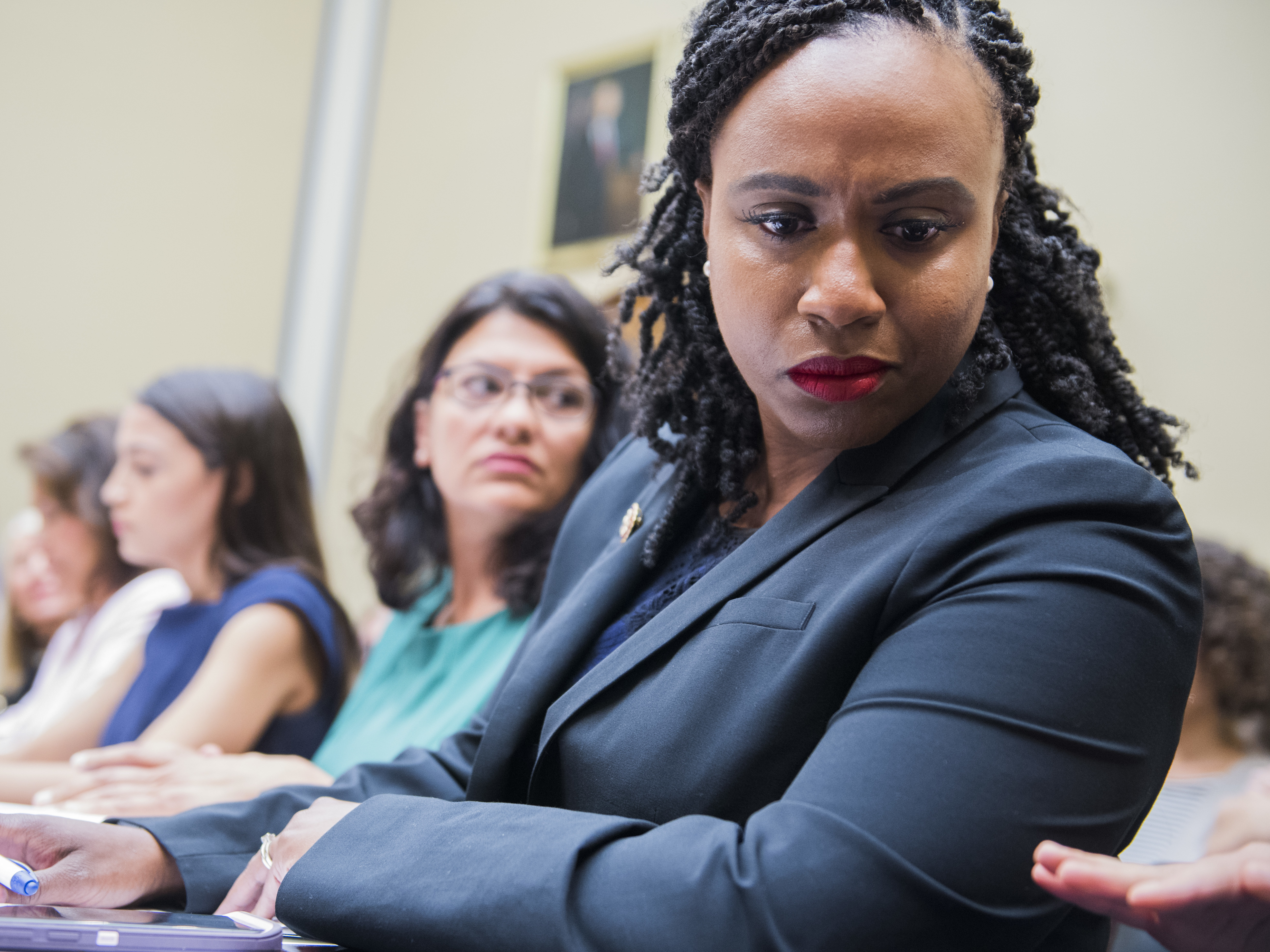 caption: Democrats on the House Committee on Oversight and Reform are examining how states regulate abortion clinics. From right, Reps. Ayanna Pressley, D-Mass., Rashida Tlaib, D-Mich., and Alexandria Ocasio-Cortez, D-N.Y.