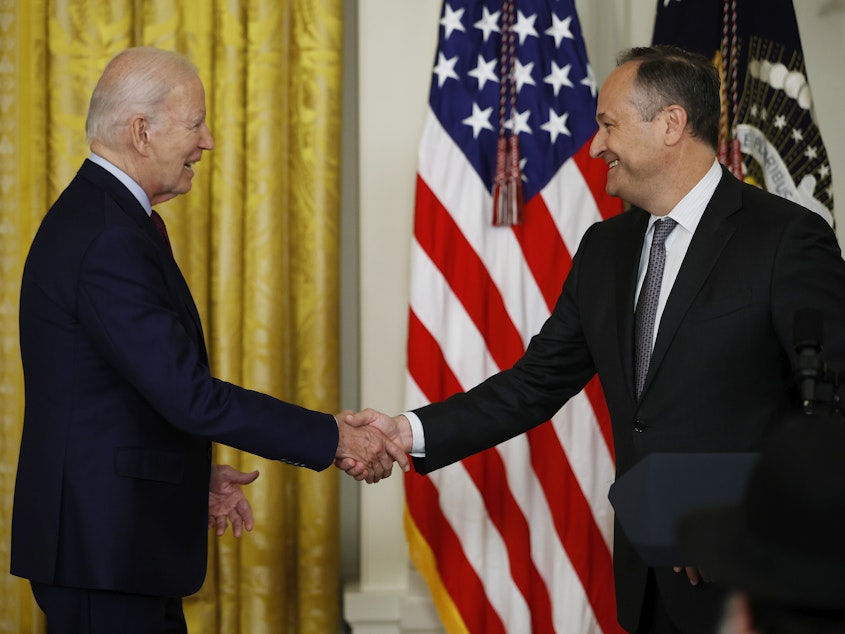 caption: President Joe Biden shakes hands with second gentleman Doug Emhoff during a celebration marking Jewish American Heritage Month last week. The administration has just released a comprehensive strategy for combating antisemitism.