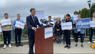 caption: Washington Attorney General Bob Ferguson addressed the multi-Bob controversy at a news conference on May 13, 2024, where he called on the other Ferguson candidates for governor to withdraw, and suggested the situation could prompt legal consequences. 