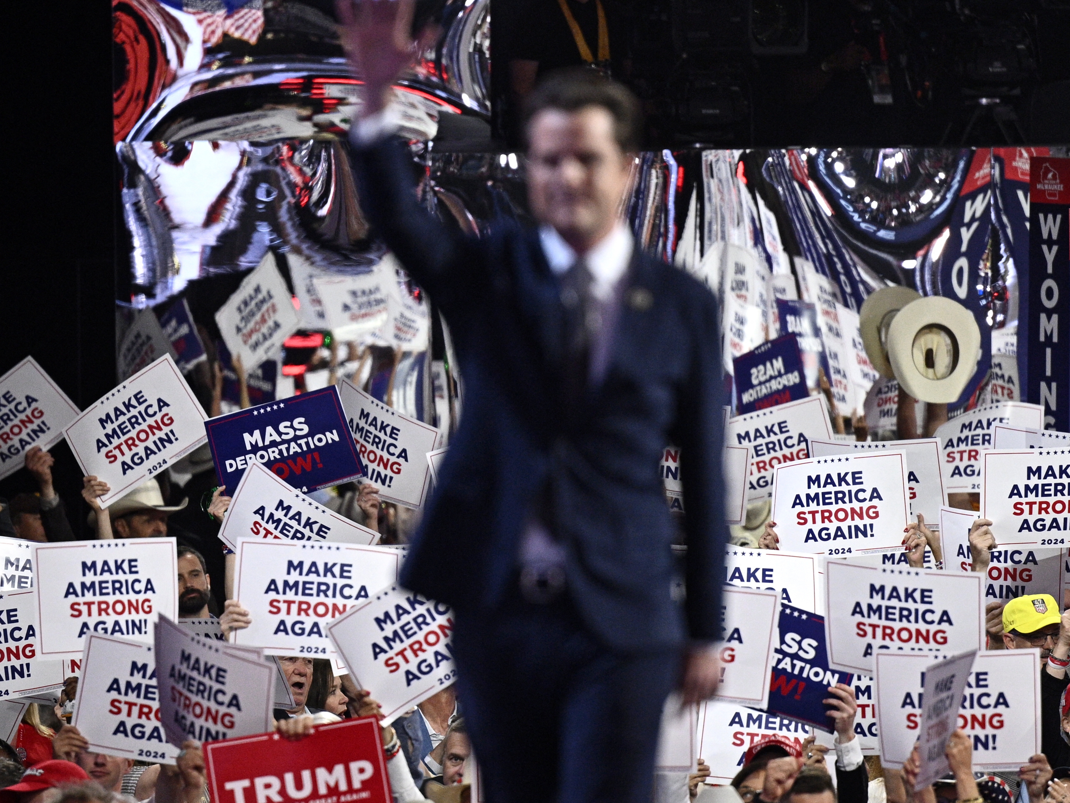 caption: Then-Congressman Matt Gaetz, R-Fla., walks off stage after speaking during the Republican National Convention in July.