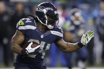 caption: FILE: Seattle Seahawks running back Marshawn Lynch rushes against the Arizona Cardinals in the first half of an NFL football game, Sunday, Nov. 15, 2015, in Seattle. 