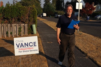 caption: Independent challenger for state Senate Chris Vance said he goes doorbelling up to six days per week, here in Auburn, Washington.