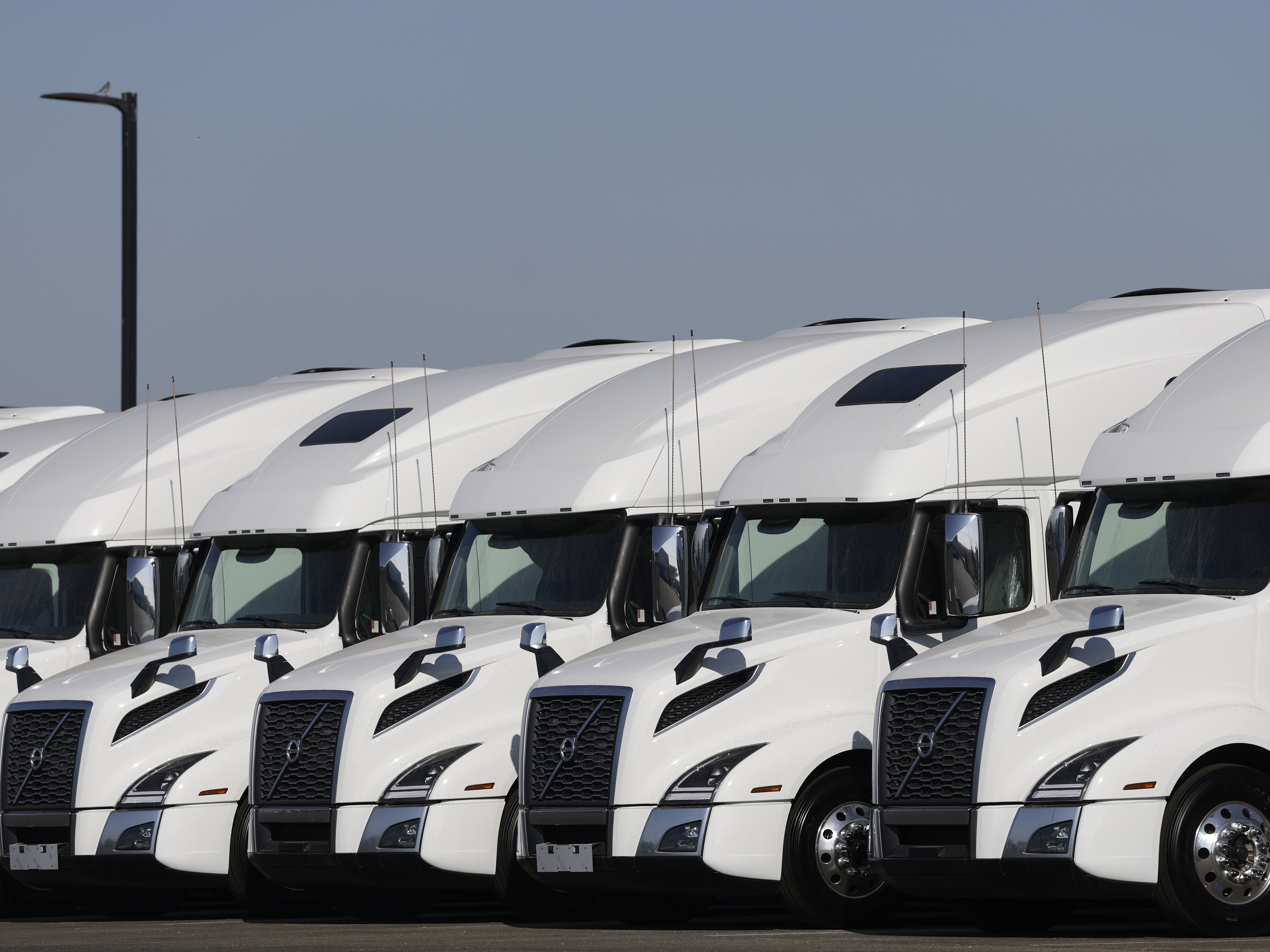 caption: The U.S. Department of Transportation is threatening to shut down thousands of truck driving schools, part of the Trump administration's widening crackdown on trucking schools and drivers.