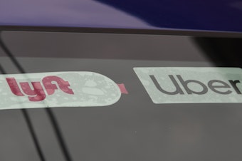 caption: Ride-share companies Lyft and Uber announced they will add a temporary surcharge on their rides to help their drivers deal with the rise in gas prices.