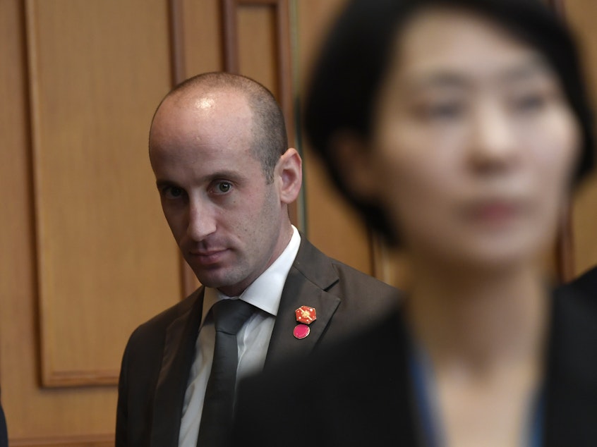 caption: White House senior policy adviser Stephen Miller waits for the start of a meeting with President Donald Trump and South Korean President Moon Jae-in at the Blue House in Seoulin June.