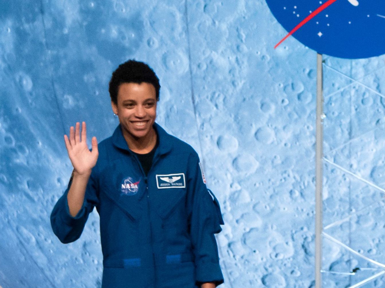 caption: NASA astronaut Jessica Watkins waves at the audience during the astronaut graduation ceremony at Johnson Space Center in Houston Texas, on January 10, 2020.