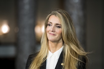 caption: Sen. Kelly Loeffler, R-Ga., waits for Vice President Mike Pence to arrive for her swear-in reenactment for the cameras in the Capitol on Monday, Jan. 6, 2020.
