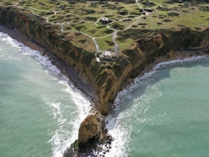 caption: An aerial view of Pointe du Hoc, a clifftop in Cricqueville-en-Bessin, on the French western Norman coast, taken in October 2018.