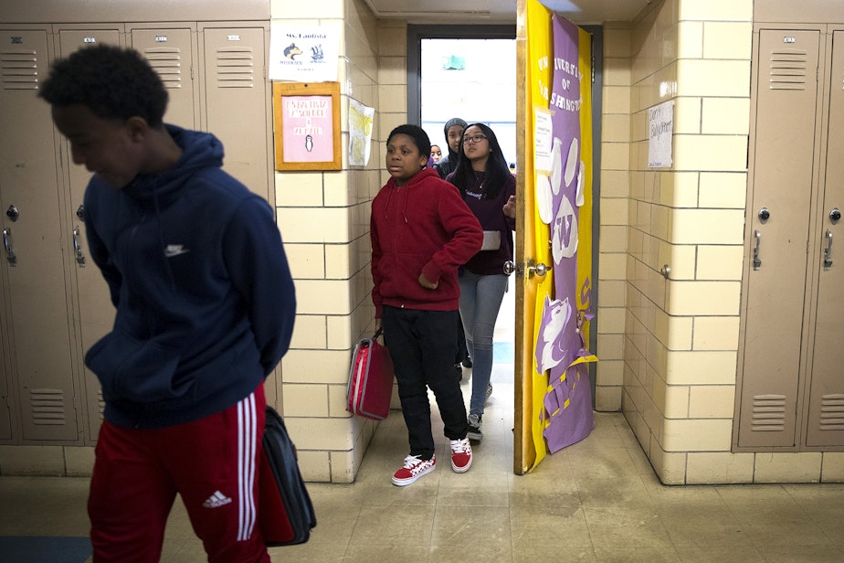 caption: Seventh-grade students leave Janet Bautista's science class as the bell rings on Thursday, March 28, 2019, at Asa Mercer Middle School in Seattle.