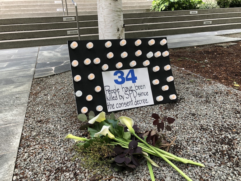 caption: Family members of people killed by Seattle police gathered outside the federal courthouse on May 30, 2023 as Judge Robart reviewed SPD's progress under the 2012 consent decree. 