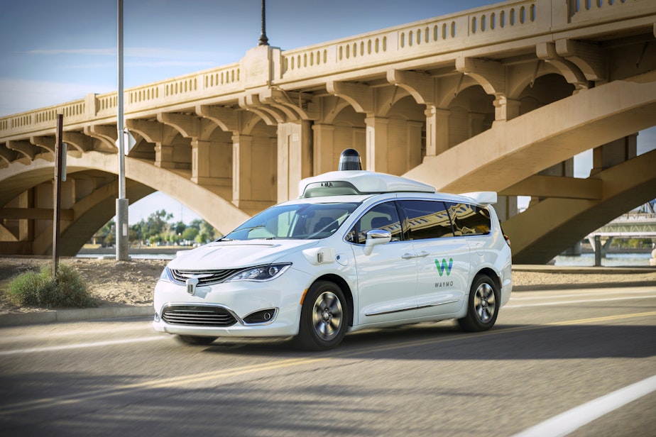 caption: This undated photo provided by Waymo shows its self-driving minivan. Google's self-driving car spinoff is finally ready to try to profit from its nearly decade-old technology. Waymo introduced a small-scale ride-hailing service in the Phoenix area Wednesday, Dec. 4, 2018, that will include a human behind the wheel in case the robotic vehicles malfunction. (Waymo via AP)