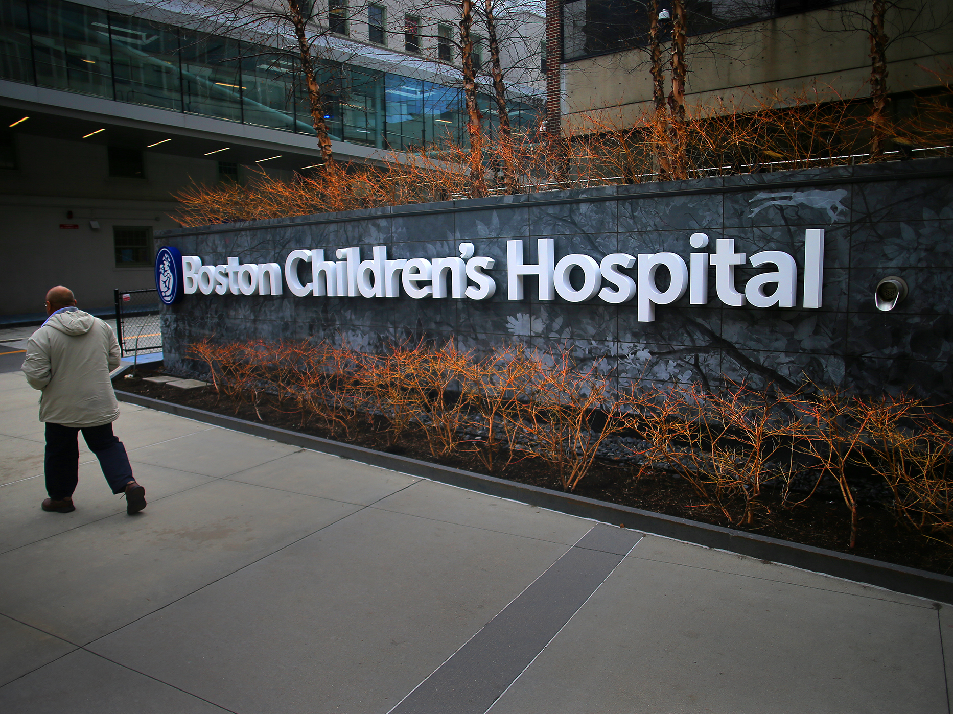 caption: Boston Children's Hospital said it had received "threats of violence toward our clinicians and staff" after false claims were made online that the hospital provides genital surgeries to minors.