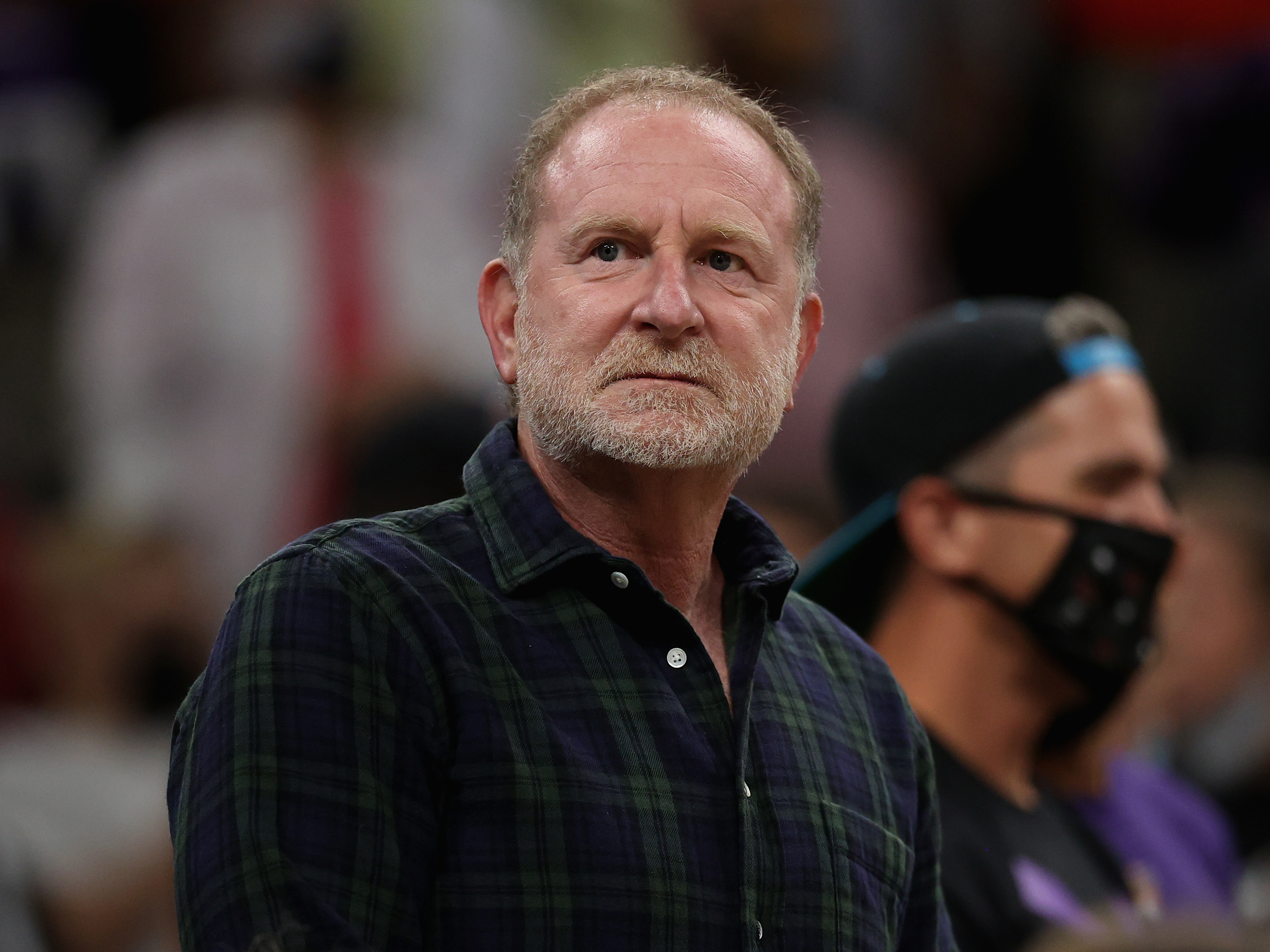 caption: Phoenix Suns and Mercury owner Robert Sarver, pictured last month, said he is "shocked" by the ESPN report that details several alleged instances in which he used racist language and sexist comments.
