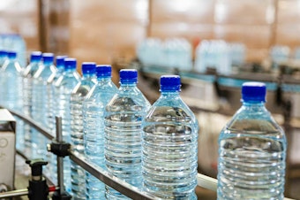 caption: Researchers from Columbia University and Rutgers University found roughly 240,000 detectable plastic fragments in a typical liter of bottled water.
