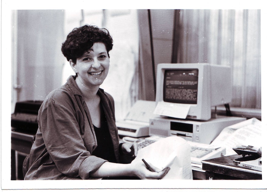 caption: Marcie Sillman preparing for 'All Things Considered.' She was KUOW's local host from 1987 to 1992.