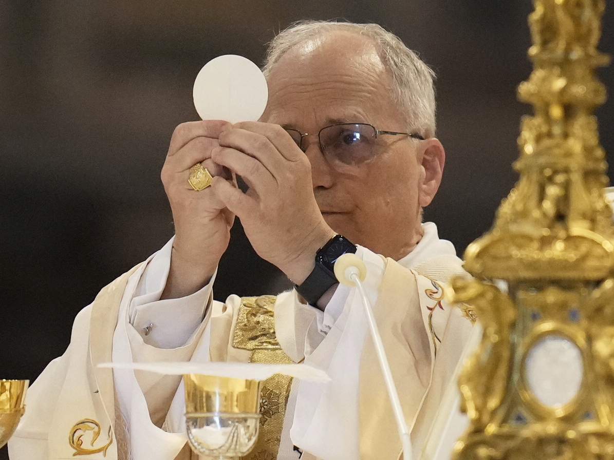 caption: Pope Leo XIV presides over a Mass in the St. John Lateran Basilica, formalizing his role as bishop of Rome in Rome on Sunday.