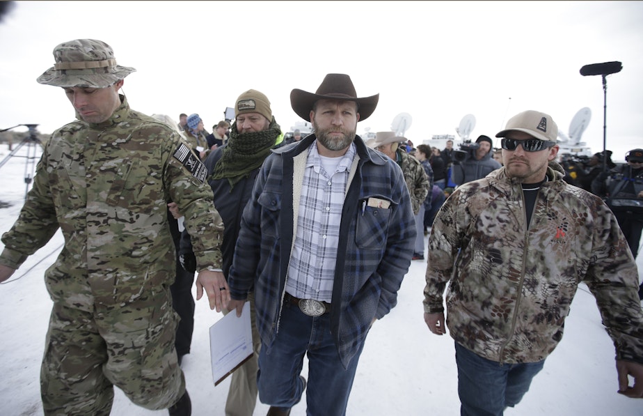 caption: In October, Ammon Bundy, center, and 6 others were acquitted of conspiracy