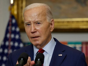 caption: President Biden is seen at the White House on May 2. In an interview with CNN on Wednesday, Biden said he would halt some weapons shipments to Israel if Prime Minister Benjamin Netanyahu ordered a full invasion of Rafah.