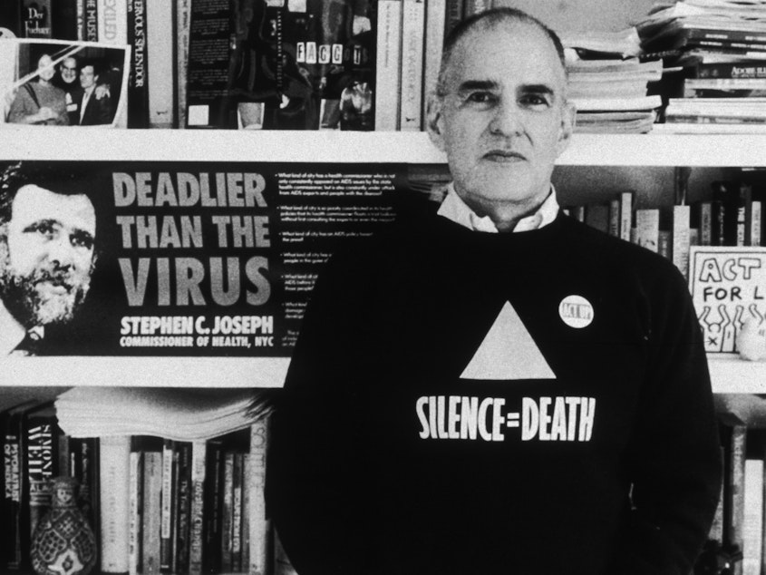caption: Writer and activist Larry Kramer, here in 1989, was an unapologetically loud and irrepressible voice in the fight against AIDS.