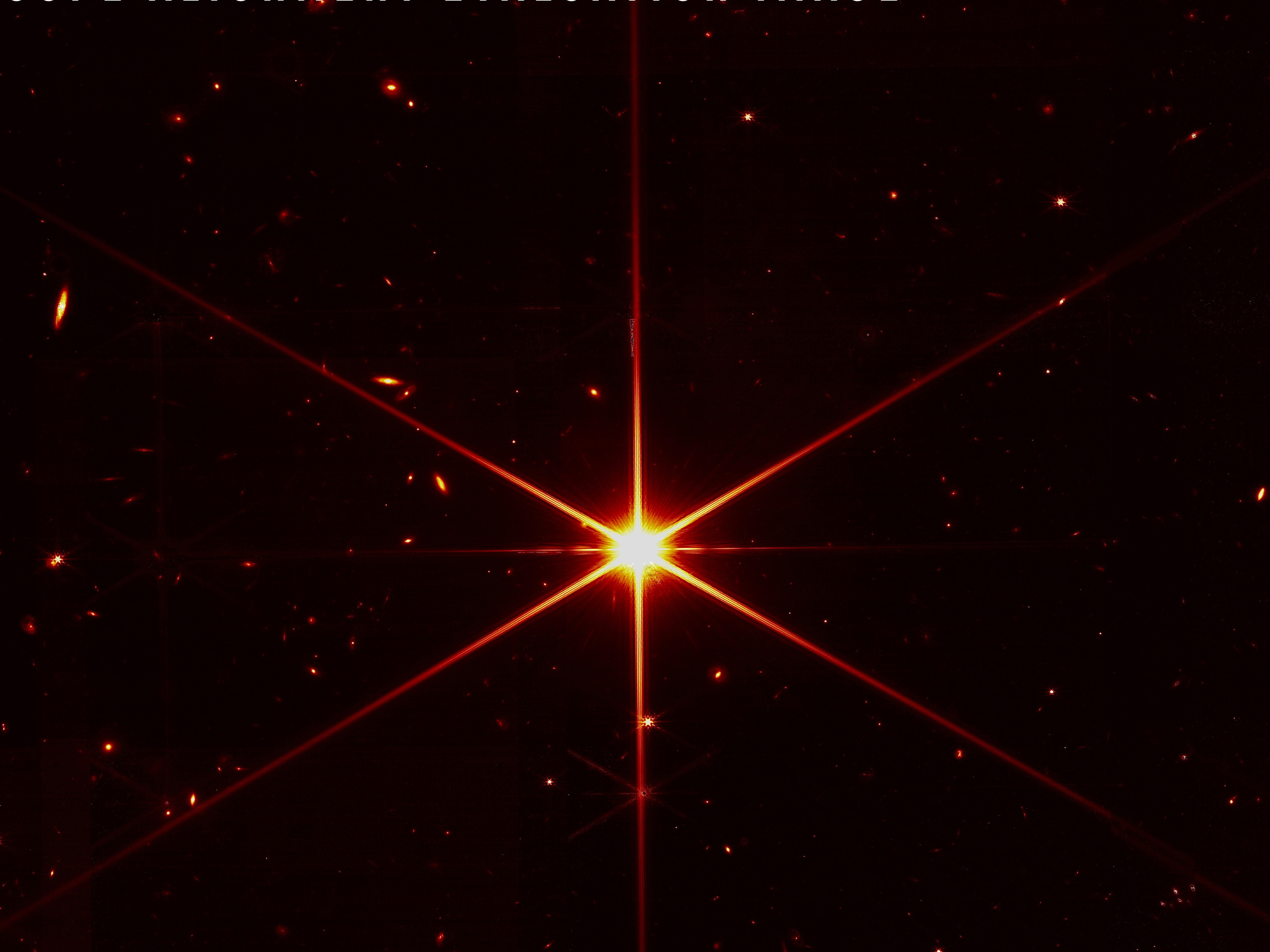 caption: This image of a star was taken as part of the evaluation process as as the James Webb Space Telescope's mirror segments were carefully aligned.