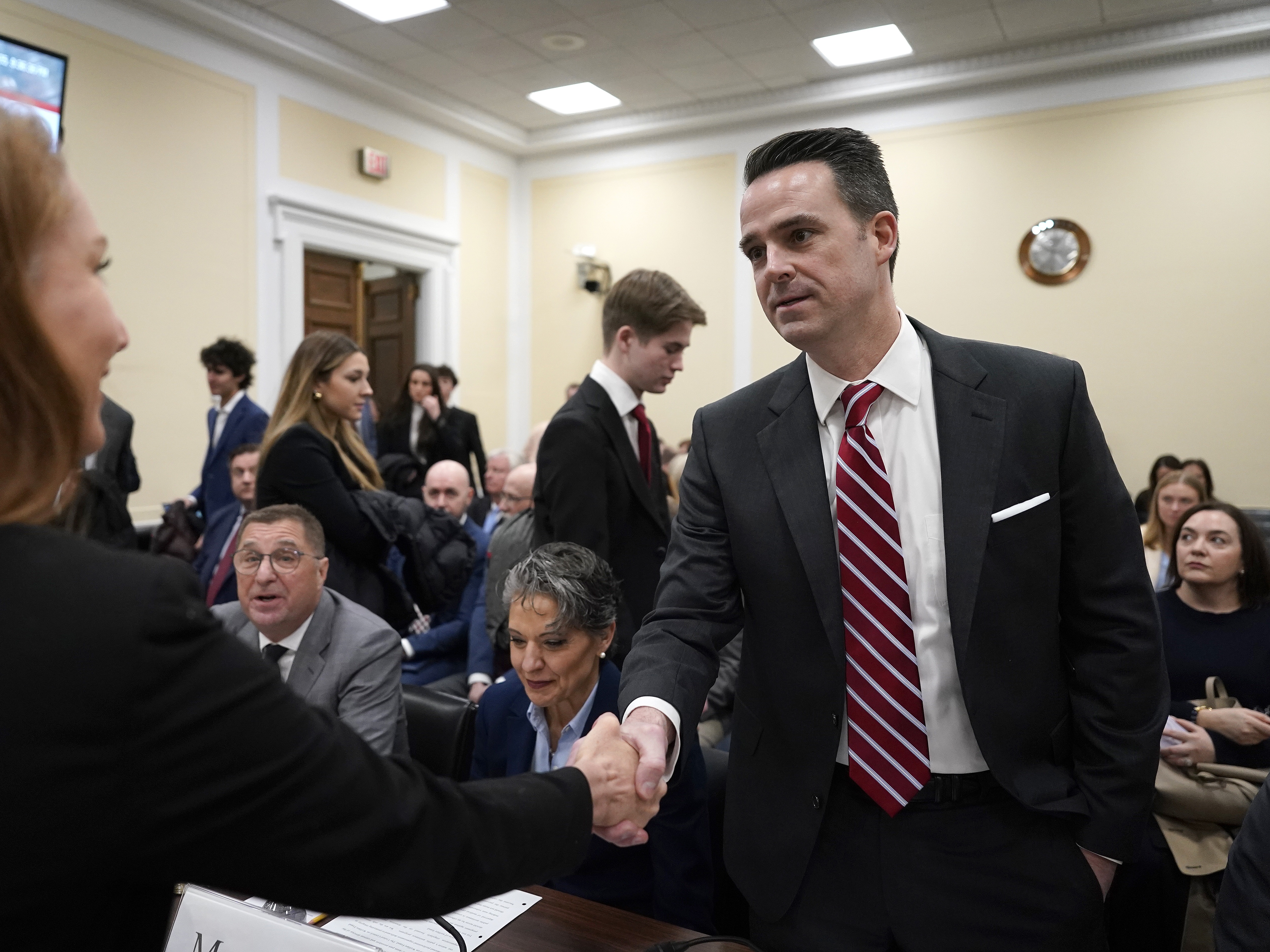 caption: Stewart Whitson, a senior director at the Foundation for Government Accountability, testified before Rep. Marjorie Taylor Greene's DOGE subcommittee in Washington, D.C., on Feb. 12. The hearing was titled "The War on Waste."