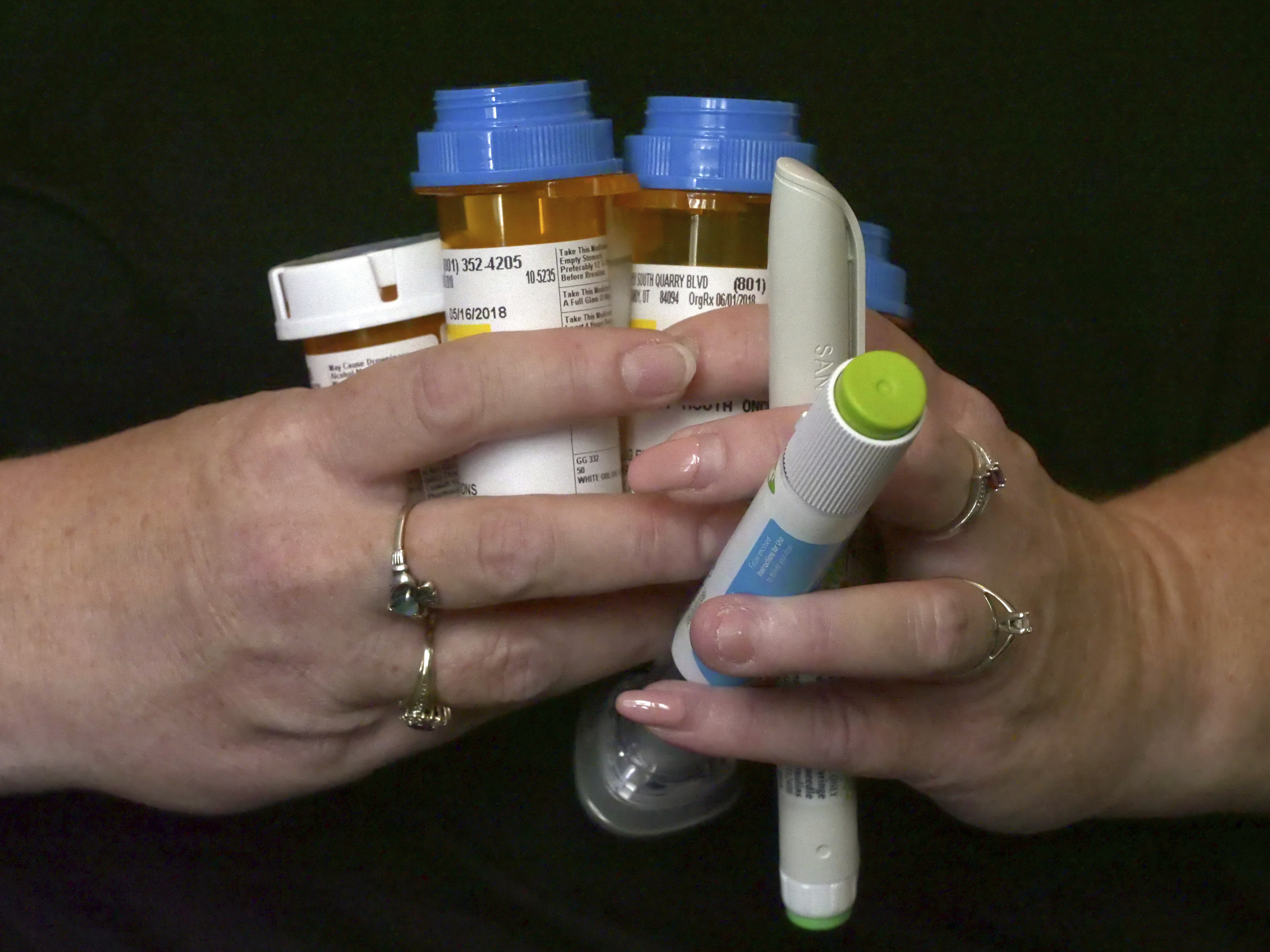 caption: Diabetes patient Bridgett Snelten at home in Sandy, Utah. The Affordable Care Act that protects people with pre-existing conditions may fall after a federal judge in Texas ruled it unconstitutional.