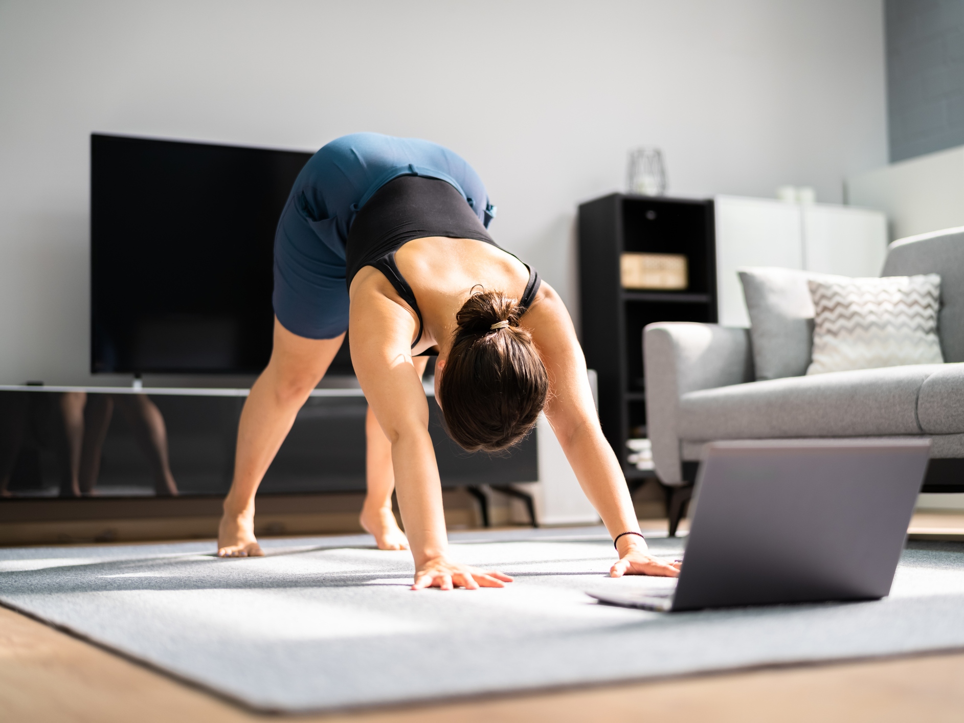 caption: Practicing yoga from home with online instruction proved beneficial to a group of people with chronic low back pain.